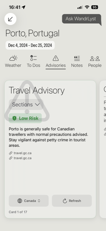 A WandrLyst travel advisory card for Porto with its risk level and sources.