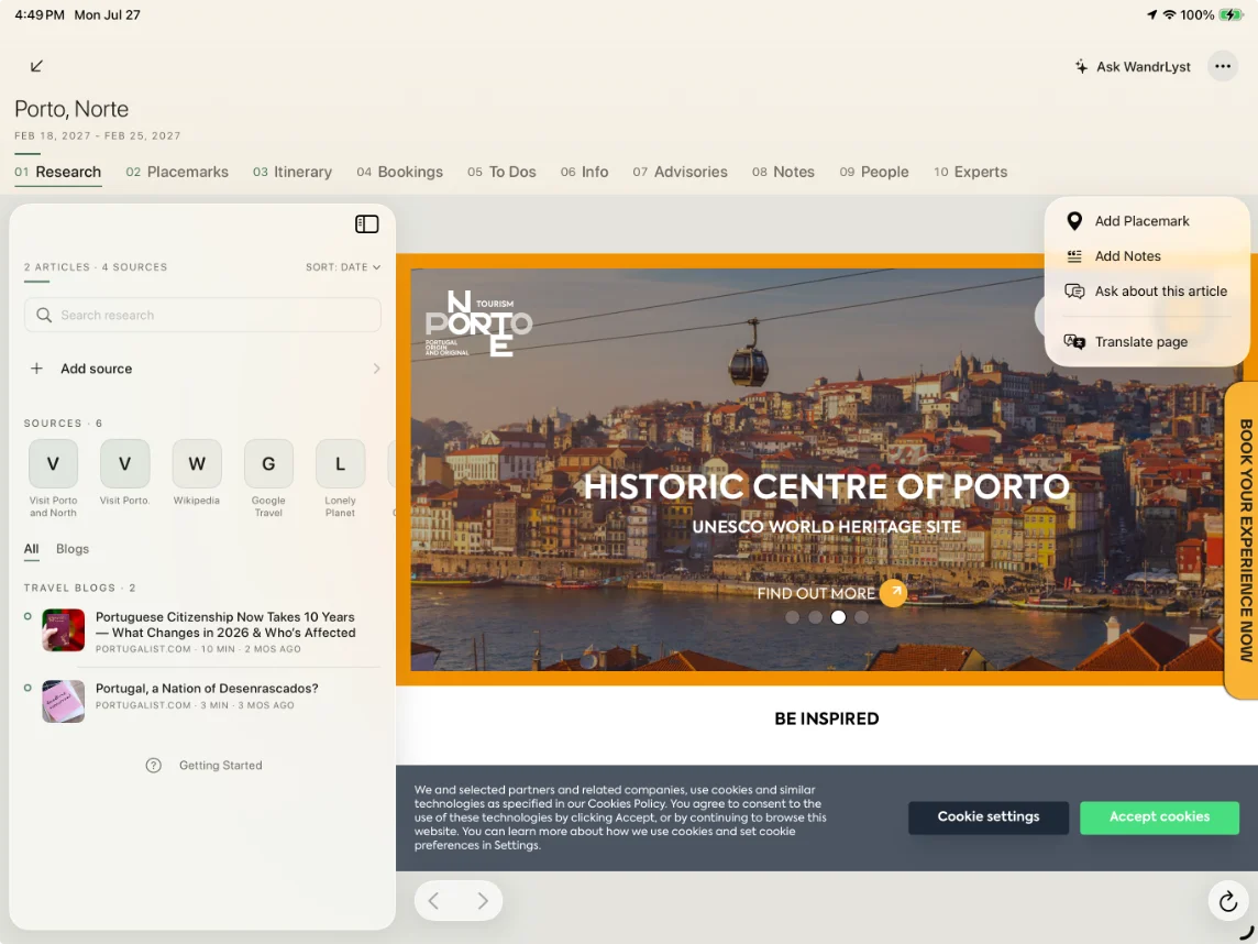 A Porto travel article open in WandrLyst on iPad, with the menu to add a placemark, add notes or ask about the article.